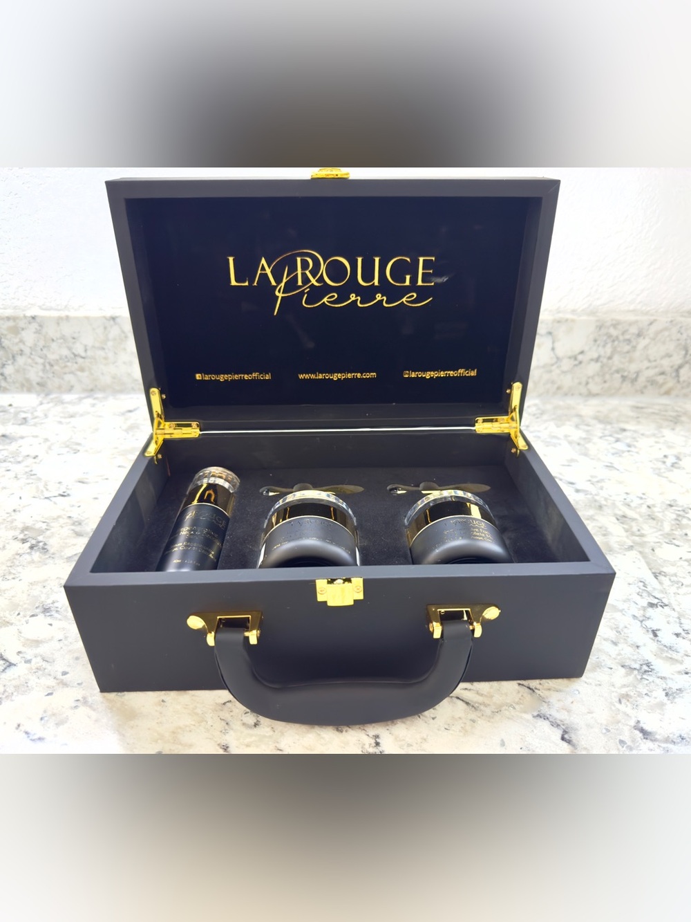 La Rouge Pierre Obsidian Collection Briefcase Skin Care Collection.